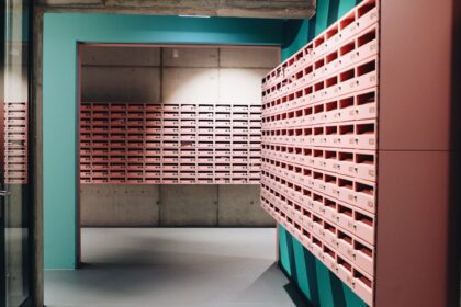 a room filled with lots of pink and blue boxes