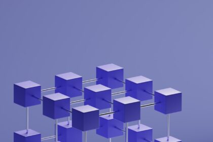 a group of purple cubes hanging from a metal bar